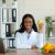 african-american-female-dietitian-holding-apple-an-2025-03-18-18-20-56-utc.jpg